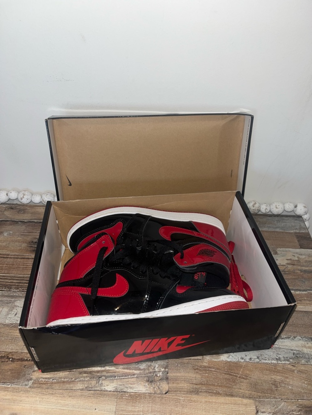 Nike Glossy Black and Red High-Top Sneakers